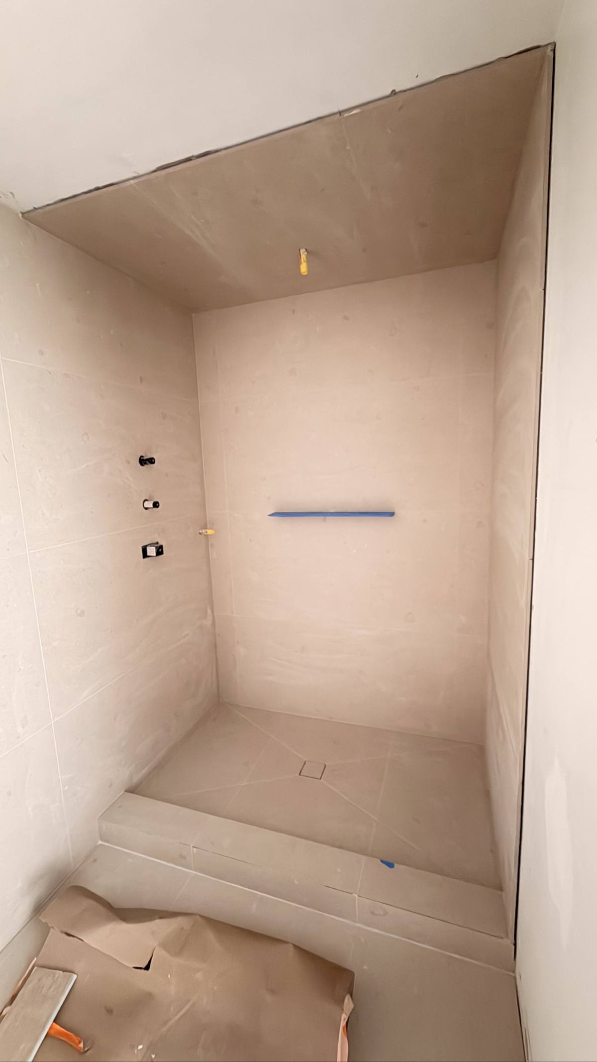 Bathroom beige stone — during install
