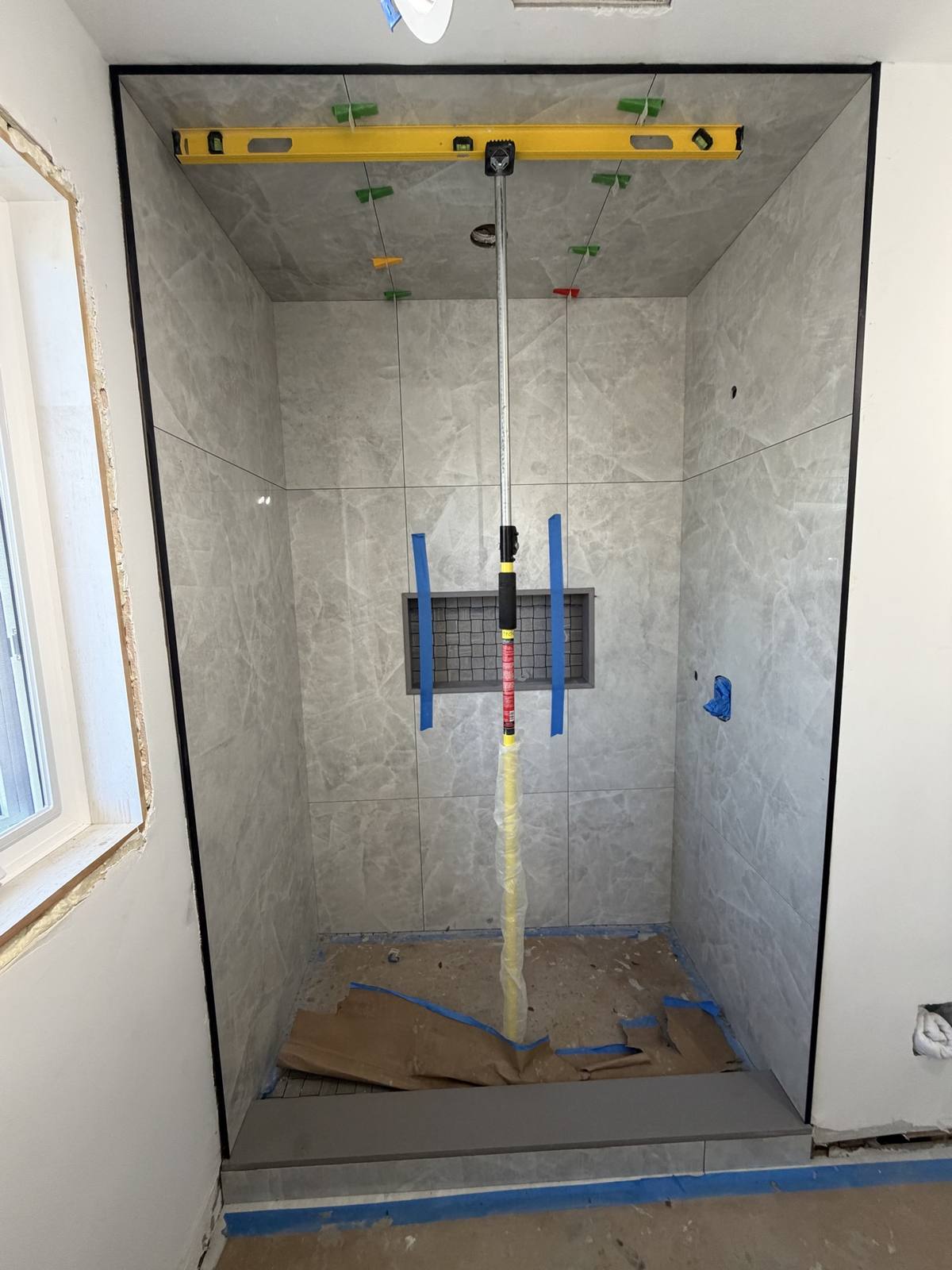 Bathroom grey marble — during install
